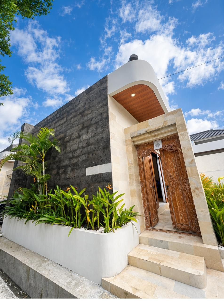 Villa facade with carved wooden door
